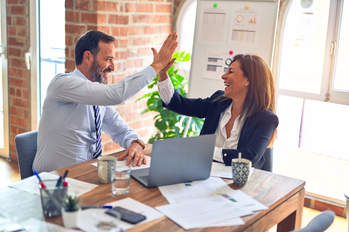 Diverse professional consulting team collaborating in a modern office