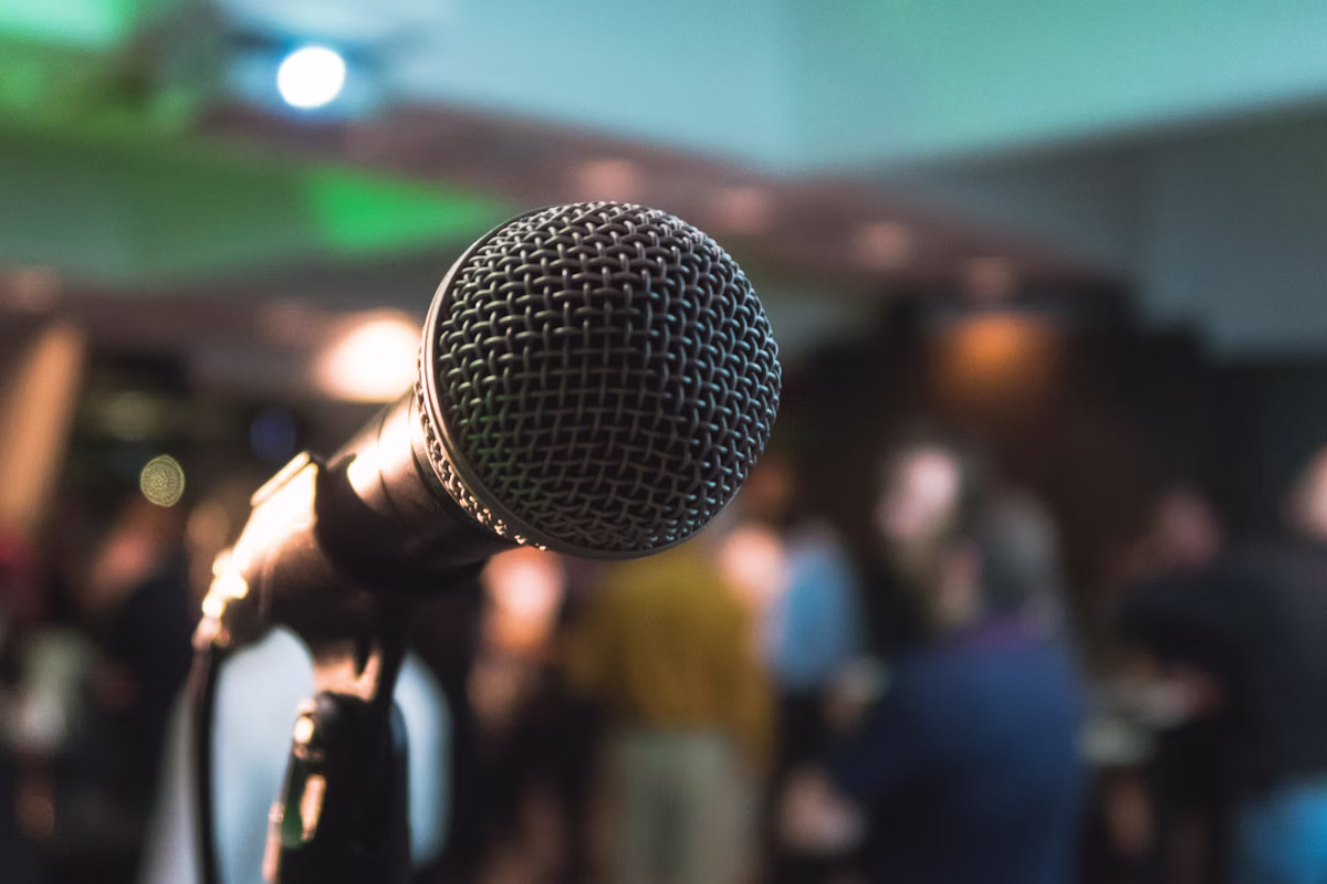 Keynote speaker presenting at a conference